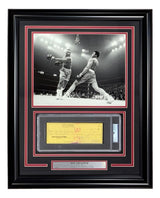 Sports Integrity presents the Joe Frazier Boxing Signed Framed Slabbed Bank Check #4617 PSA/DNA, featuring a black-and-white photo of two boxers in the ring above an autographed yellow check and descriptive plaque.