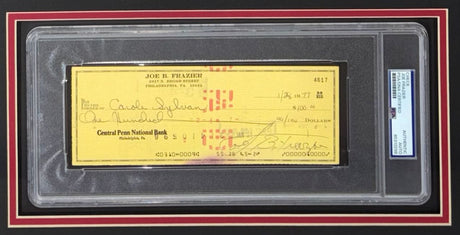 The Sports Integrity Joe Frazier Boxing Signed Framed Slabbed Bank Check #4617 features a PSA/DNA authenticated Central Penn National Bank check, encased in a protective display with black and red borders.