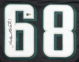 Close-up of a Jordan Mailata Philadelphia Signed Black Football Jersey by Sports Integrity, featuring large white and green number 68 and a signature in black ink on the number 6.