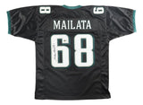 The Sports Integrity Jordan Mailata Philadelphia Signed Black Football Jersey BAS features Mailata's name and #68 in large white print with green-accented numbers and sleeve trim, plus his signature on the left side of the number.