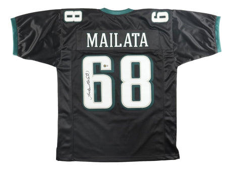 The Sports Integrity Jordan Mailata Philadelphia Signed Black Football Jersey BAS features Mailata's name and #68 in large white print with green-accented numbers and sleeve trim, plus his signature on the left side of the number.