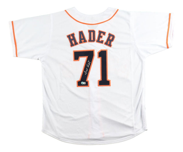 The Sports Integrity Josh Hader Houston Signed White Baseball Jersey features orange trim, "HADER" and #71 in black and orange on the back, with Hader’s signature on the number.