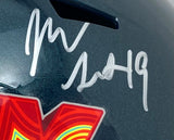 A close-up of the Josh Sweat signed Philadelphia Eagles FS Super Bowl 59 LIX replica helmet by Sports Integrity, featuring a vibrant V sticker and a white "M 49" signature.