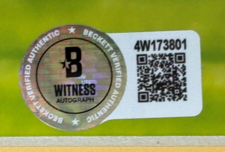 A Beckett Witness Autograph sticker with holographic effect and white QR-coded label “4W173801” appears on the Justin Jefferson Signed Framed 16x20 Vikings vs Chargers Photo by Sports Integrity.