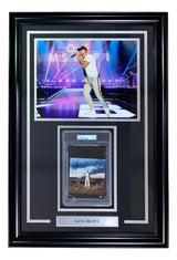 Sports Integrity’s Kane Brown Signed Framed “The High Road” CD booklet with an 11x14 photo, authenticated by PSA.