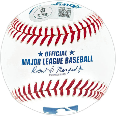 A close-up of a Sports Integrity Ken Griffey Jr. Seattle Mariners Signed Official MLB Baseball, featuring red stitching, MLB logo, "OFFICIAL MAJOR LEAGUE BASEBALL," and Ken Griffey Jr.'s autograph.