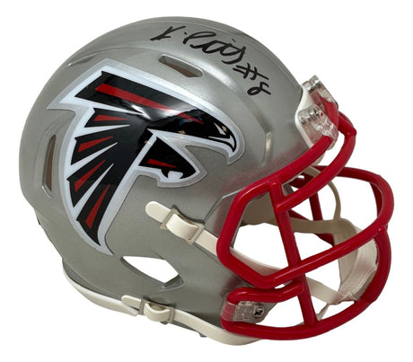 The Sports Integrity Kyle Pitts Signed Atlanta Falcons Flash Mini Speed Helmet features a silver shell, red facemask, large falcon logo, and Kyle Pitts’ signature with the number 8 in black marker.