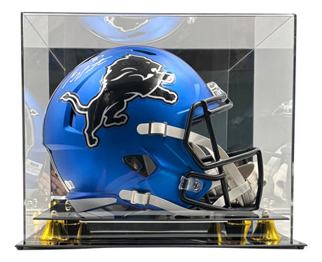 The Sports Integrity Sam LaPorta Signed Lions FS Alternate Blue Speed Replica Helmet features the black lion logo, is autographed on top, and comes displayed in a clear case with mirrored back and gold supports.