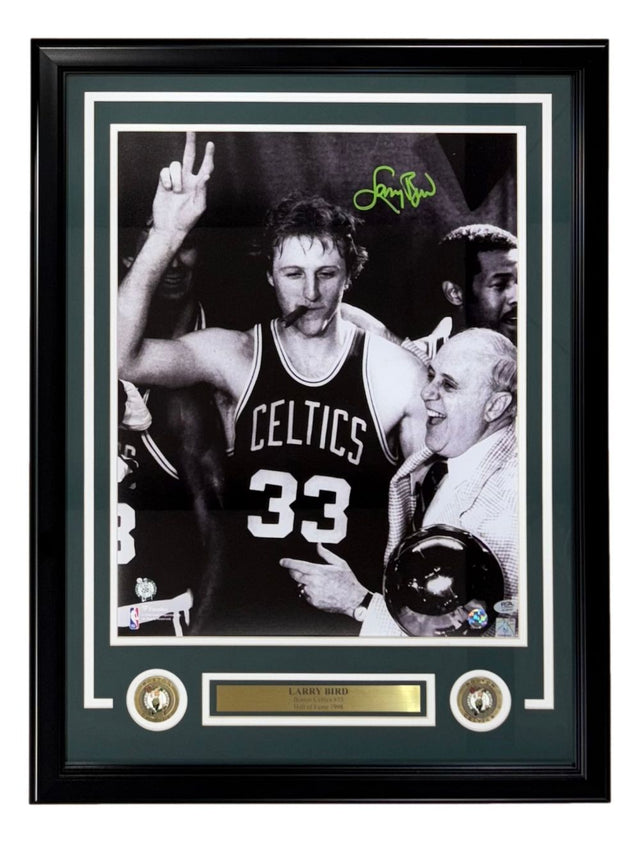 The Sports Integrity Larry Bird Signed Framed 16x20 Boston Celtics Photo features Larry Bird and Red Auerbach, includes PSA/DNA authentication, two commemorative coins, a nameplate, and is autographed by Bird.