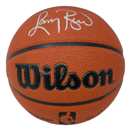A Larry Bird Boston Celtics Signed Wilson NBA Basketball by Sports Integrity, featuring Bird's autograph in white ink on the top panel, black Wilson logo, and a small silhouette logo near the bottom.
