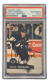 The Sports Integrity Larry Robinson Signed 1991 Pro Set #104 LA Kings Hockey Card (PSA/DNA 85041896) features Robinson with a hockey stick on the ice, encased in a PSA/DNA certified holder labeled "Authentic Auto.