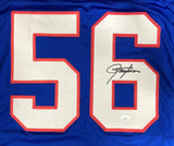 The Lawrence Taylor New York Signed Blue Football Jersey by Sports Integrity features bold white and red 56 on the front, with Taylor’s black ink signature on the right side of the 6 and an official JSA hologram.