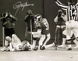 The Sports Integrity Lawrence Taylor Signed 16x20 photo captures a dramatic Giants moment: Taylor sacks Cunningham as referees signal and photographers snap shots from the sideline. Authenticated by JSA QR.