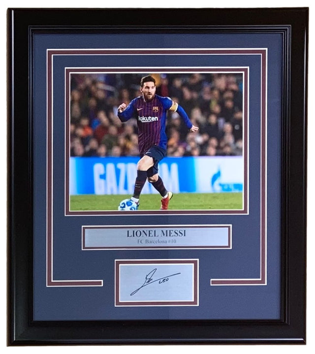 The Sports Integrity Lionel Messi Framed 8x10 Barcelona FC Photo features a laser-engraved signature and nameplate, showcasing Messi in his #10 uniform with the ball.