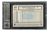 A Sports Integrity Juan Marichal signed 2017 Topps #207 San Francisco Giants card, graded BAS Auto 10, featuring black borders and detailed career pitching stats on the back.