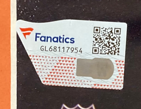 A close-up of a Sports Integrity authenticity sticker with the Fanatics logo, code GL68117954, QR code, and silver scratch-off on the Mark Messier Signed Framed 16x20 Edmonton Oilers Stanley Cup Photo.