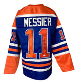 The Sports Integrity Mark Messier Edmonton Signed Blue Hockey Jersey (JSA) features "MESSIER" and number 11 on the back with an authentic signature on one digit.