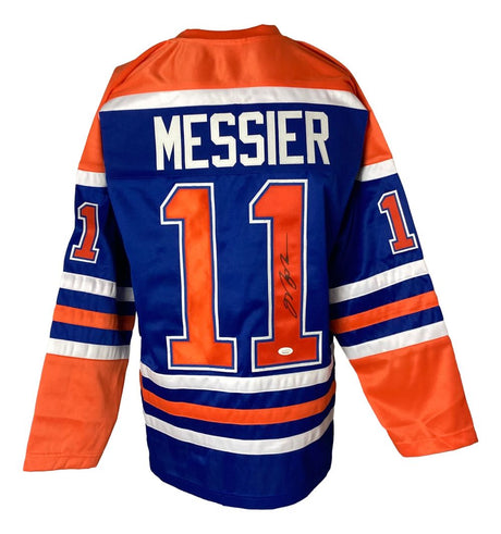 The Sports Integrity Mark Messier Edmonton Signed Blue Hockey Jersey (JSA) features "MESSIER" and number 11 on the back with an authentic signature on one digit.