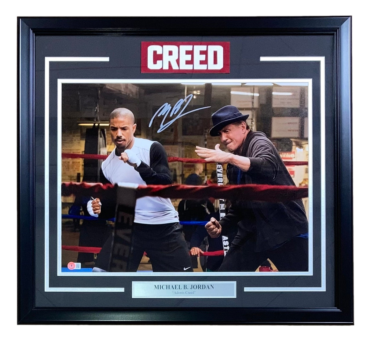 Sports Integrity’s Michael B Jordan Signed Framed 16x20 Creed Training Photo with Stallone, featuring both men boxing in the gym, includes BAS ITP authentication and a "CREED" logo above.