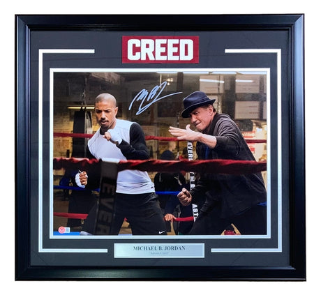 Sports Integrity’s Michael B Jordan Signed Framed 16x20 Creed Training Photo with Stallone, featuring both men boxing in the gym, includes BAS ITP authentication and a "CREED" logo above.