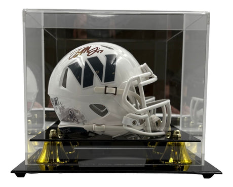 The Sports Integrity Terry McLaurin Signed Commanders Salute Service Mini Speed Helmet is showcased in a clear acrylic display case with a black base and gold accents.