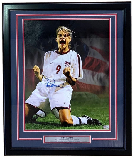The Sports Integrity Mia Hamm Signed Framed 16x20 USA Women’s Soccer Collage Photo (BAS ITP) features the soccer star’s autograph and a collage of her in action.