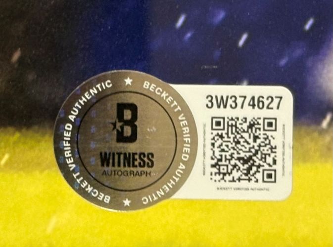 A Beckett Witness Autograph sticker with QR code and serial 3W374627 is shown on a yellow and blue background for the Michael Busch Signed Framed 16x20 Chicago Cubs Photo by Sports Integrity.