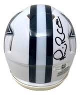 The Michael Irvin Signed Dallas Cowboys White Mini Speed Helmet by Sports Integrity features a dark blue center stripe, black signature on top, and partially visible team star logos. Includes JSA QR hologram for authenticity.