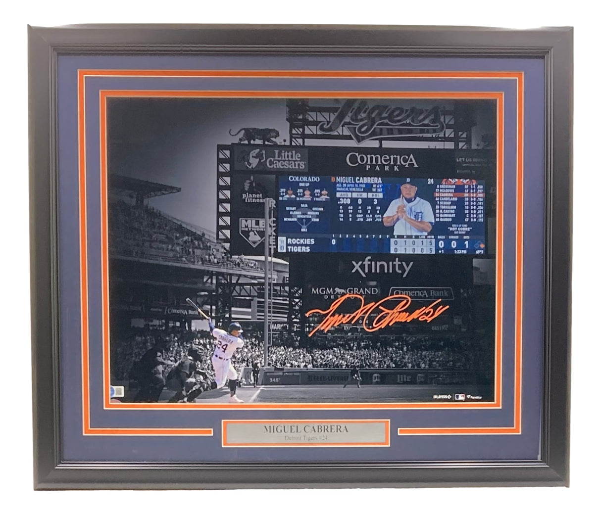 The Sports Integrity Miguel Cabrera Signed Framed 16x20 Detroit Tigers Scoreboard Photo (BAS) features Cabrera's orange autograph, a nameplate, and depicts him batting at Comerica Park with the crowd and scoreboard visible.