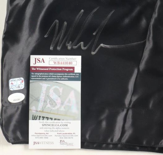 Sports Integrity Mike Tyson Signed Custom Black Boxing Trunks, featuring a silver autograph with JSA ITP certification card and matching sticker (WW441040) included for authentication.
