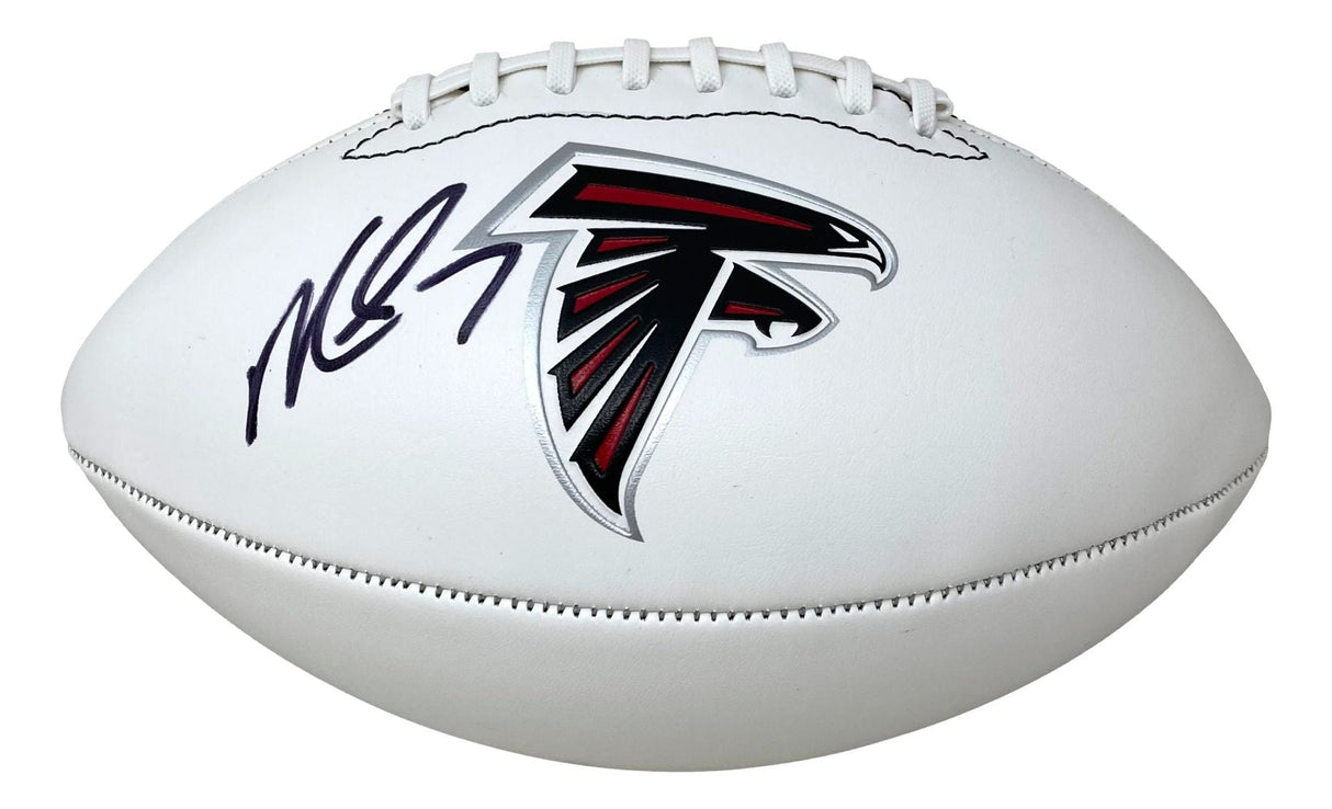 The Sports Integrity Michael Vick Signed Atlanta Falcons Logo Football features the team logo and Michael Vick's black autograph on its white surface.