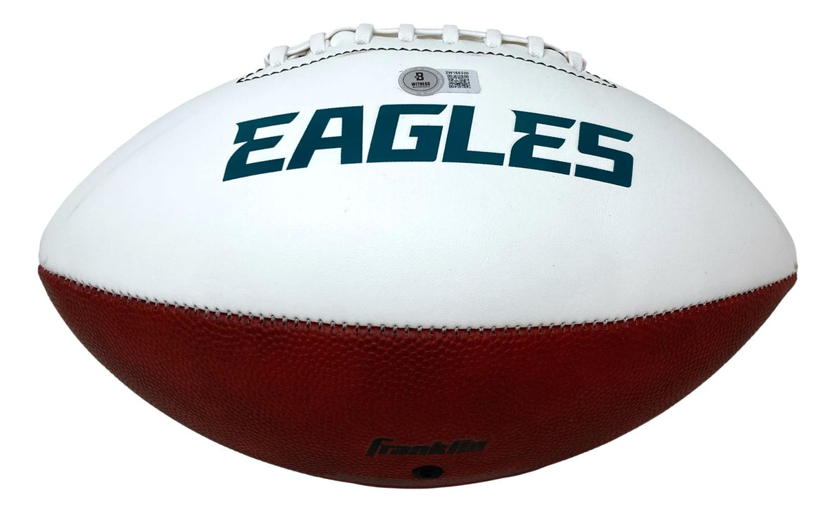 The Sports Integrity Michael Vick Signed Philadelphia Eagles Logo Football BAS features a white upper half with bold green "EAGLES" lettering, a brown lower half, visible laces, and a textured surface.