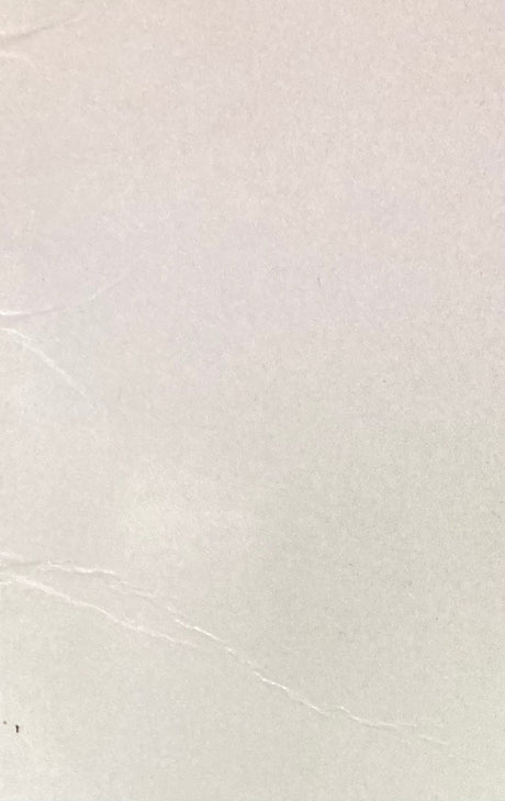Close-up of the Molly Ringwald Signed The Breakfast Club Vinyl Record by Sports Integrity, showing a light-colored surface with subtle creases and faint lines, suggesting smooth vinyl with minor imperfections. Authenticated by JSA (WB072006).