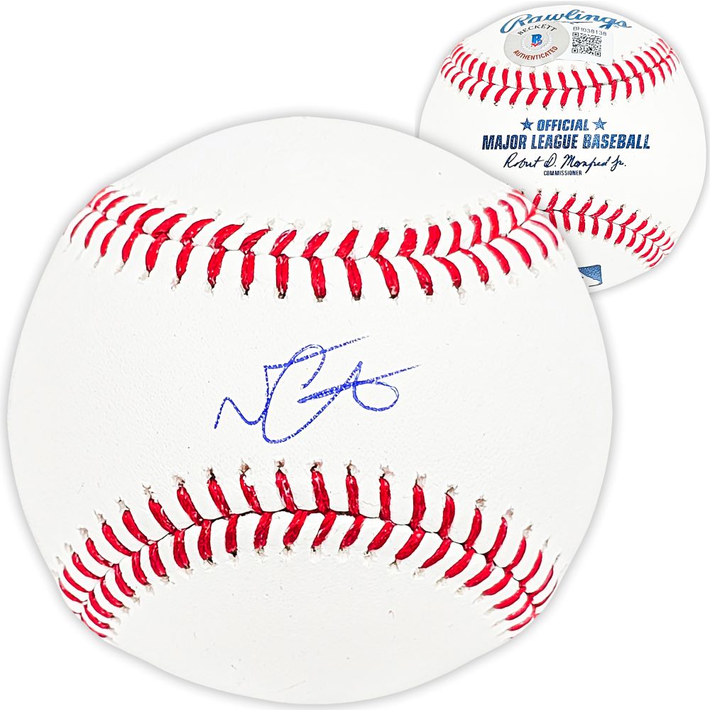 A Nestor Cortes New York Yankees signed Rawlings official MLB baseball by Sports Integrity, featuring a blue autograph on the front and close-up of the MLB branding and commissioner’s signature in the background.
