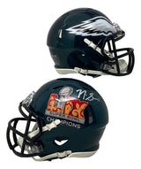 This Sports Integrity mini helmet features the Philadelphia Eagles' dark green design with black faceguard and is signed by Nick Sirianni. It commemorates Super Bowl LIX and is authenticated by BAS.
