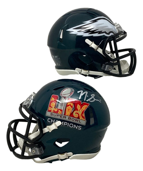 This Sports Integrity mini helmet features the Philadelphia Eagles' dark green design with black faceguard and is signed by Nick Sirianni. It commemorates Super Bowl LIX and is authenticated by BAS.