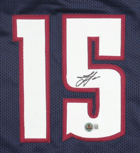 Sports Integrity Nikola Jokic Denver Signed Navy Basketball Jersey BAS features a navy jersey with large white and red number 15, an autograph on the 5, and a BAS authentication sticker near the bottom.