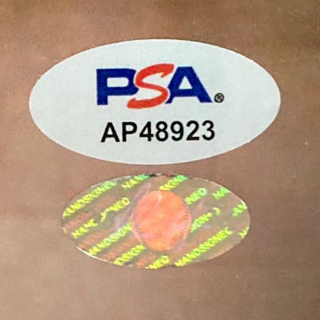 A Sports Integrity Nolan Ryan Signed Framed 16x20 Texas Rangers Bloody Lip Photo includes an oval PSA logo sticker above AP48923 and a holographic sticker with repeating AUTHENTIC text below it.