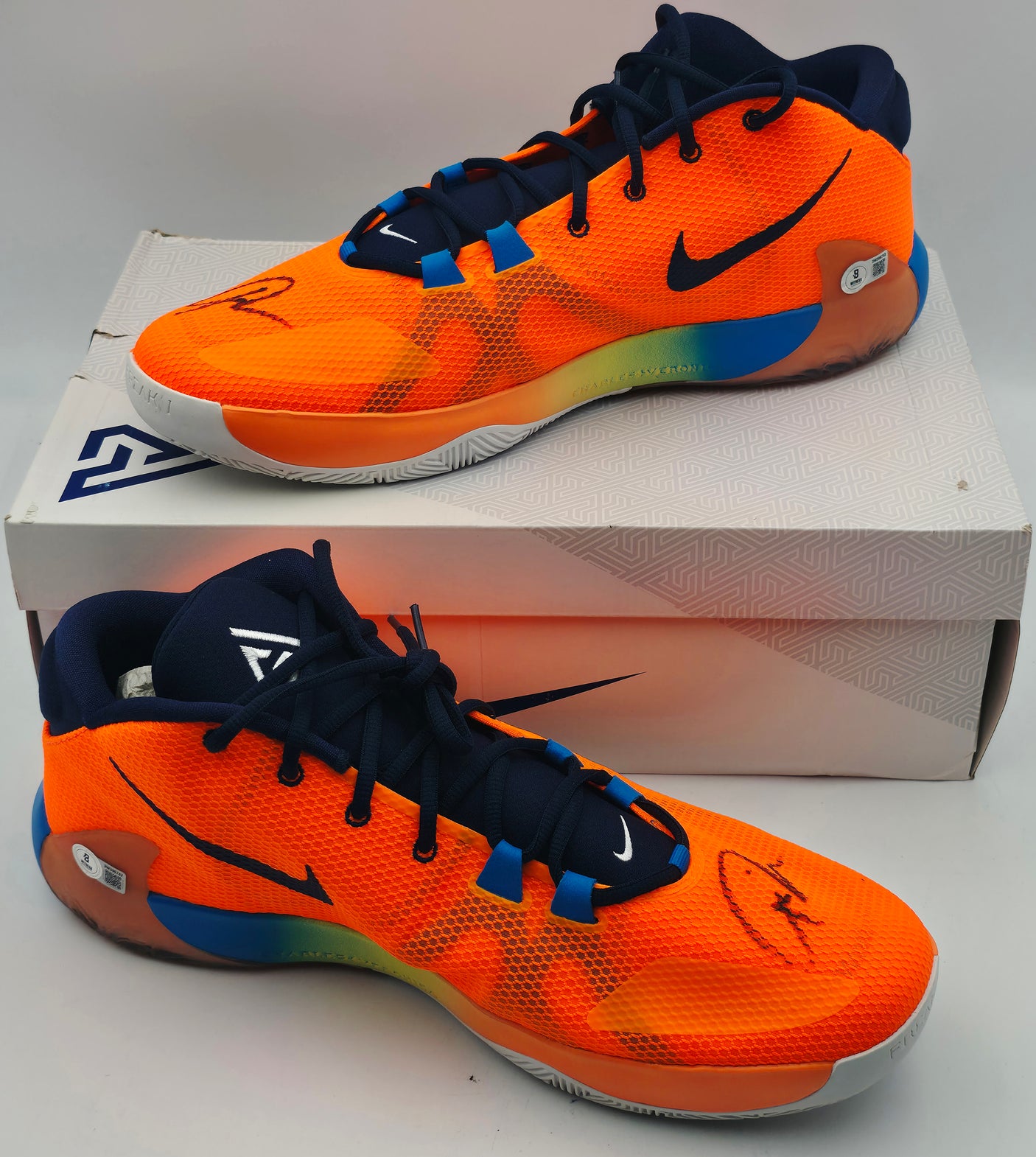 Giannis Antetokounmpo Autographed 2019 Player Exclusive (PE) Promo Total Orange, Mid Navy & Phantom Blue Nike Zoom Freak 1 Shoes Milwaukee Bucks Size 17 (With Box) Beckett BAS Witness #3W396742 & #3W396743