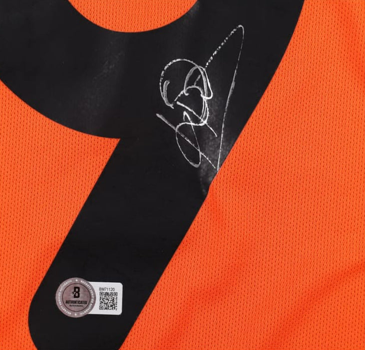 The Sports Integrity Patrick Kluivert Signed Netherlands Nike Soccer Jersey features an orange design, large black number 9 with a white autograph, and a BAS-authenticated sticker with QR code in the corner.
