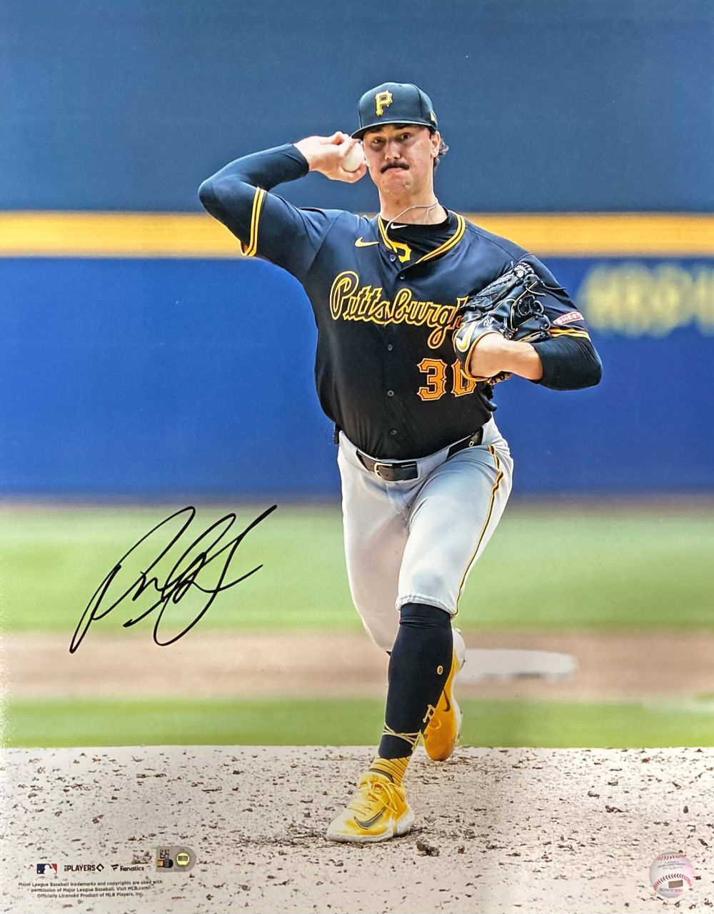 The Paul Skenes Signed 16x20 Pittsburgh Pirates Photo by Sports Integrity shows Skenes mid-pitch in a black and yellow uniform, with his autographed action shot authenticated by an MLB hologram.
