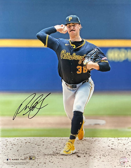 The Paul Skenes Signed 16x20 Pittsburgh Pirates Photo by Sports Integrity shows Skenes mid-pitch in a black and yellow uniform, with his autographed action shot authenticated by an MLB hologram.