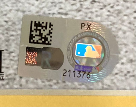 A close-up of the official MLB hologram with QR code and number 211376 on the Sports Integrity Paul Skenes Signed Framed 16x20 Pittsburgh Pirates Photo.