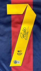 A close-up of the Pedro Signed Barcelona Nike Soccer Jersey from Sports Integrity shows a yellow number 7 with signature, club crest, and BAS authentication sticker.
