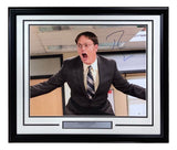 The Sports Integrity Rainn Wilson Signed Framed 16x20 Photo features Dwight Schrute as manager in The Office, suited and yelling with arms outstretched. Includes a plaque and JSA authentication, matted with a black border.