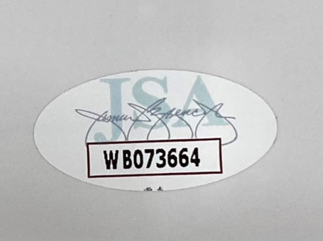 This Sports Integrity Rainn Wilson Signed Framed 16x20 "The Office" Dwight Schrute Manager Photo features a JSA sticker with faint blue letters, a central signature, and bold black code WB073664 in a white rectangle bordered in red.