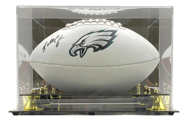 The Sports Integrity Randall Cunningham Signed Philadelphia Eagles Logo Football comes in a clear acrylic display case with gold supports.