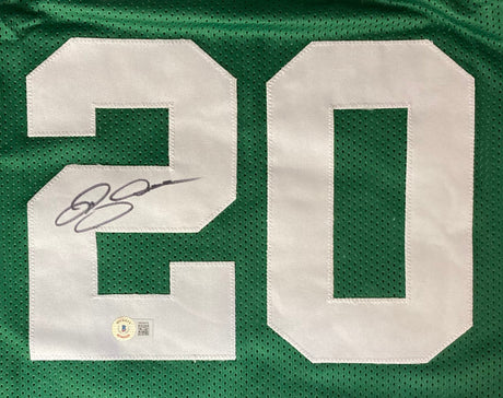 The Ray Allen Boston Signed Green Basketball Jersey by Sports Integrity features a bold white number 20, signed in black marker on the left side of the "2," with an authentication sticker near the number’s bottom.