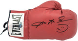 A Sugar Ray Leonard signed red Everlast right hand boxing glove by Sports Integrity, featuring a black autograph and smiley face on a white background.