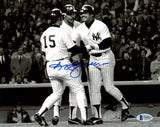 Three New York Yankees in pinstripes celebrate on the field in this Sports Integrity Reggie Jackson Signed B&W 8x10 Photo (BAS), with a blue autograph visible and cheering fans in the background.